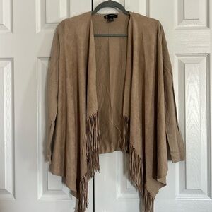 Elegant and versatile jacket in excellent condition! Perfect for throwing over